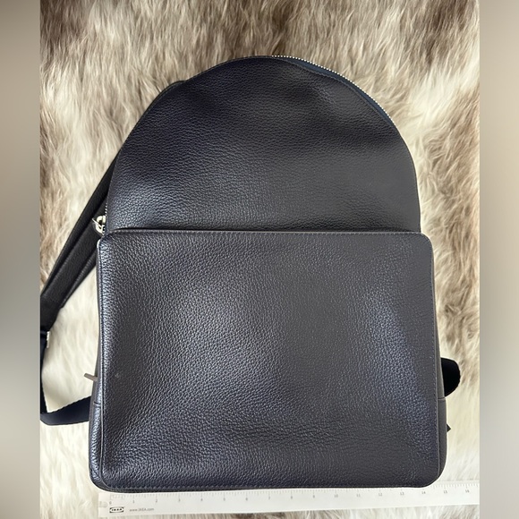 Anya Hindmarch leather backpack in dark blueunisex